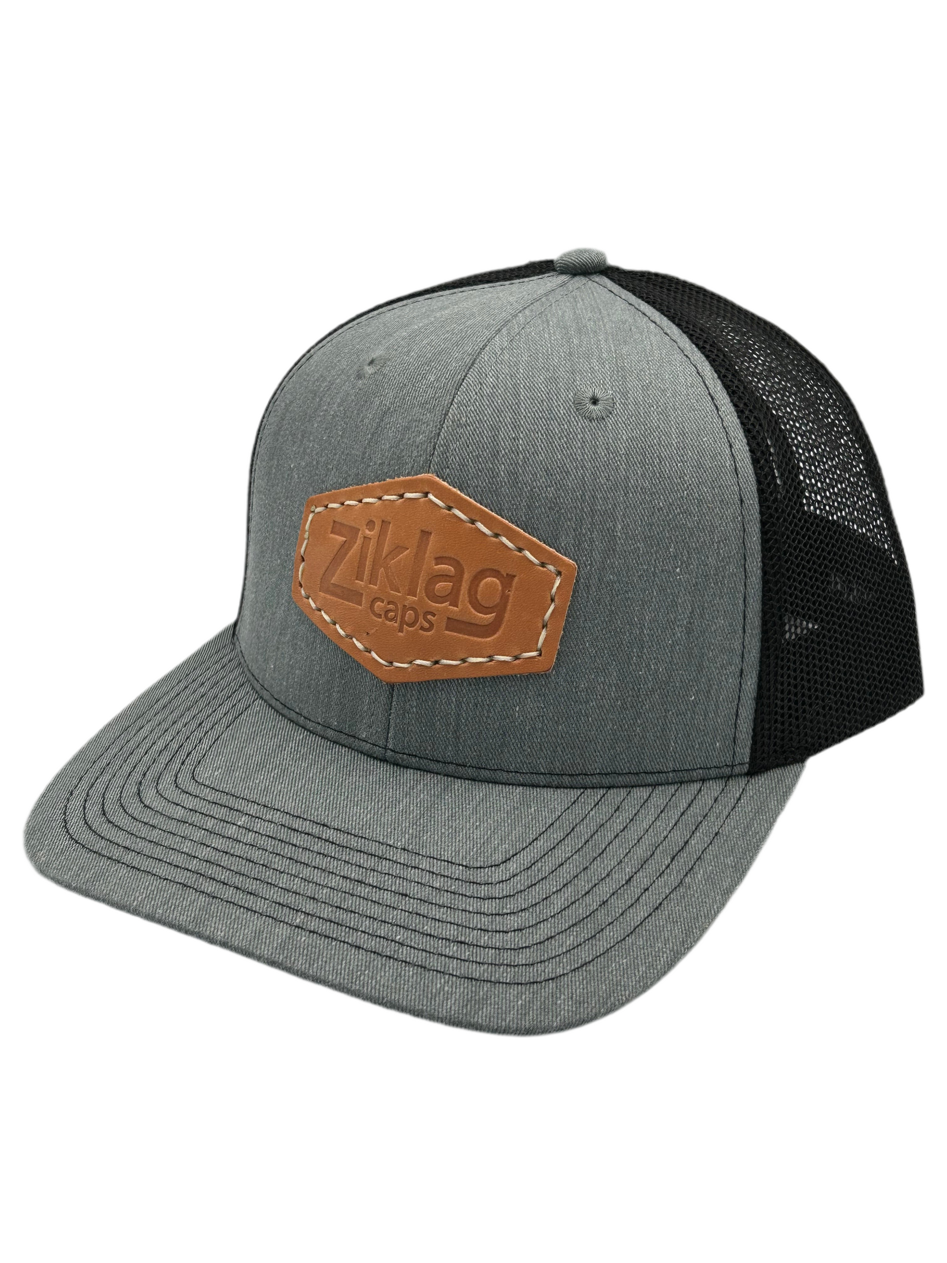 Heathered Grey with Black Mesh Trucker Hat and Genuine Cold Pressed Leather Patch, Left Side